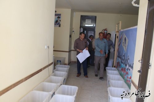 آماده سازی صندوق های اخذ رأی توسط اعضای هیئت اجرایی انتخابات شهرستان مراوه تپه 